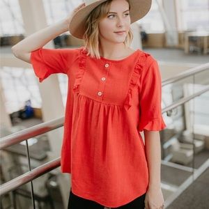 Ruffle button blouse